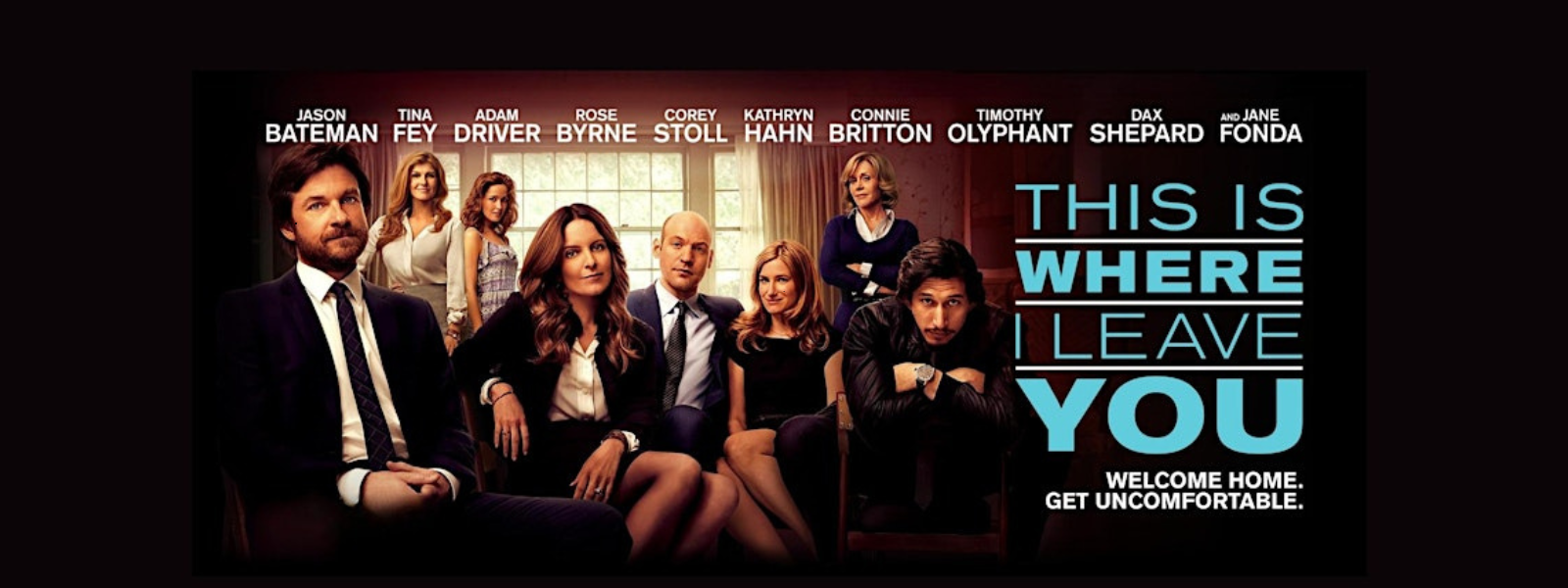 A group of eight people in formal attire sit and stand in a warmly lit room, conveying a tense yet humorous vibe. Text reads, "This Is Where I Leave You."