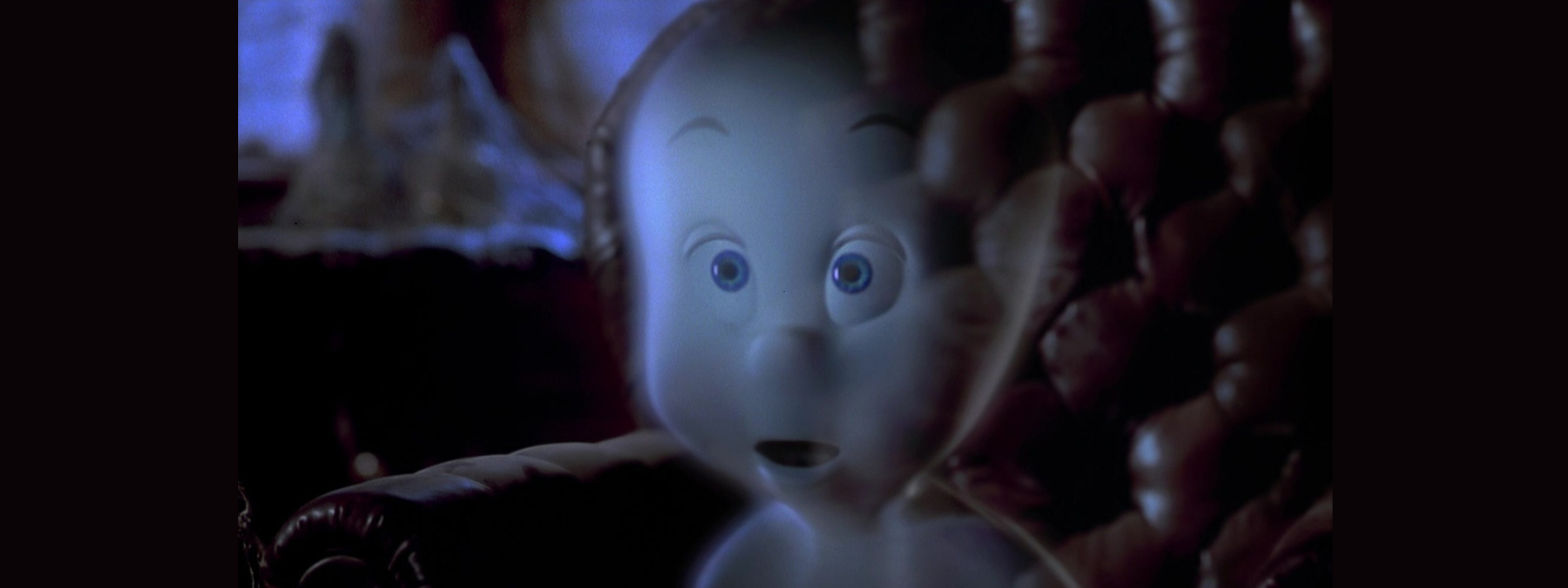 A friendly ghost with a glowing, translucent body and wide eyes sits on a plush armchair in a dimly lit room, conveying a curious and gentle mood.