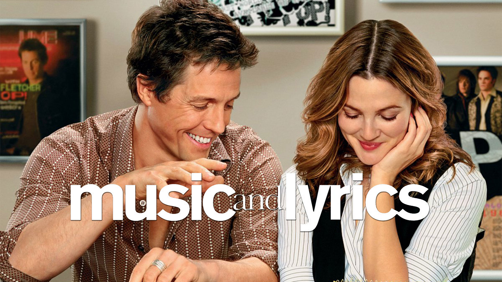 Man and woman sit closely, smiling warmly. Text "music and lyrics" overlays the image. Background features framed photos and music-themed decor. Romantic and lighthearted tone.